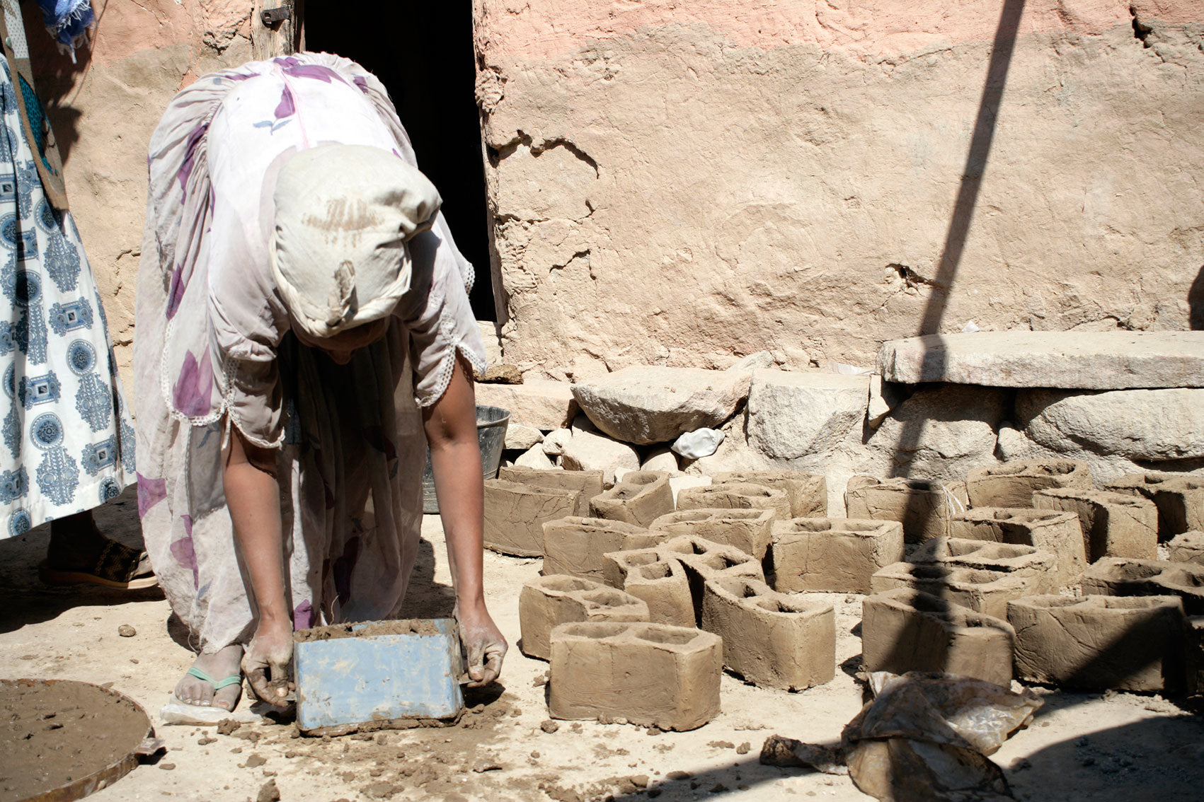 A cookstove maker producing efficient stoves for a community project