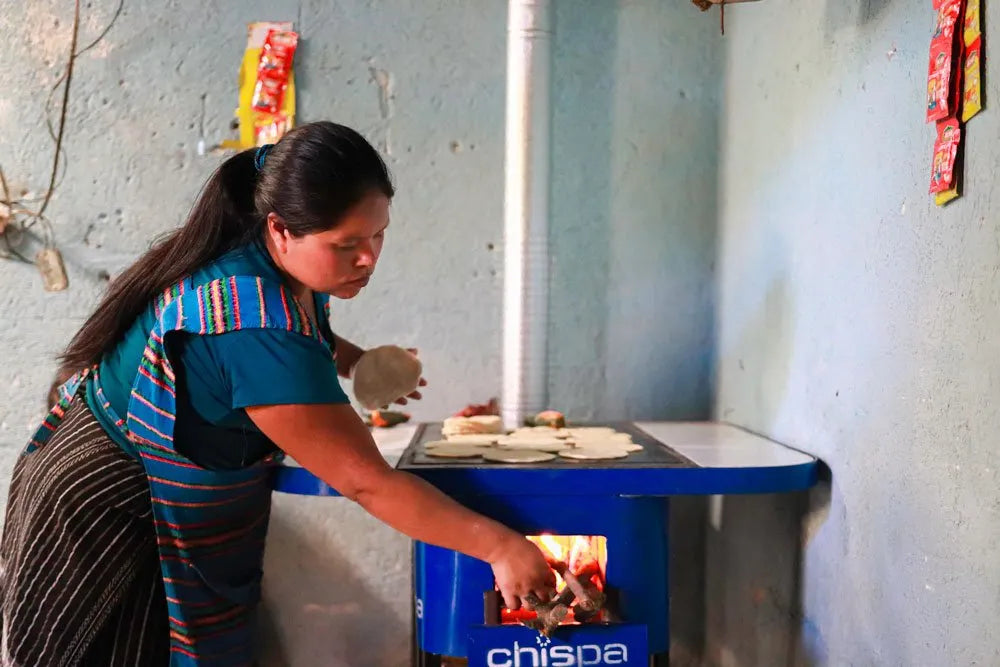 An improved cookstove in use in a CO2balance project household
